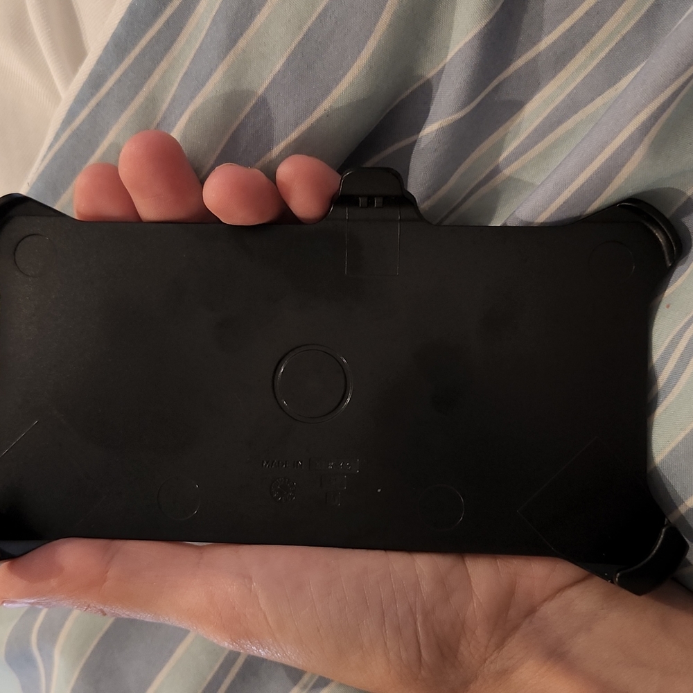 Otterbox black phone holster for Samsung Galaxy s22 phone.